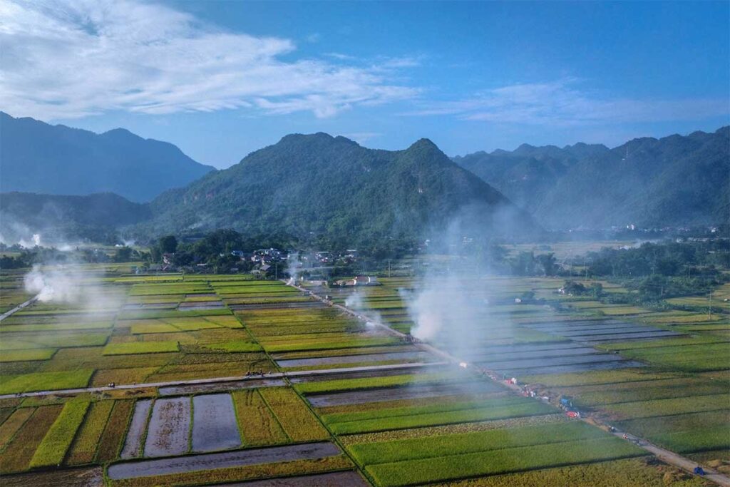 An aerial view of the Mai Chau rice fields surrounding Lac Village