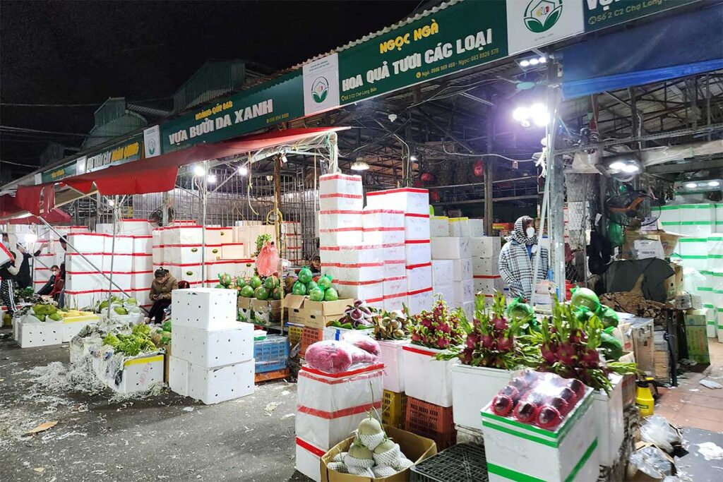 Boxes full of fruits sold at the Long Bien Market in Hanoi