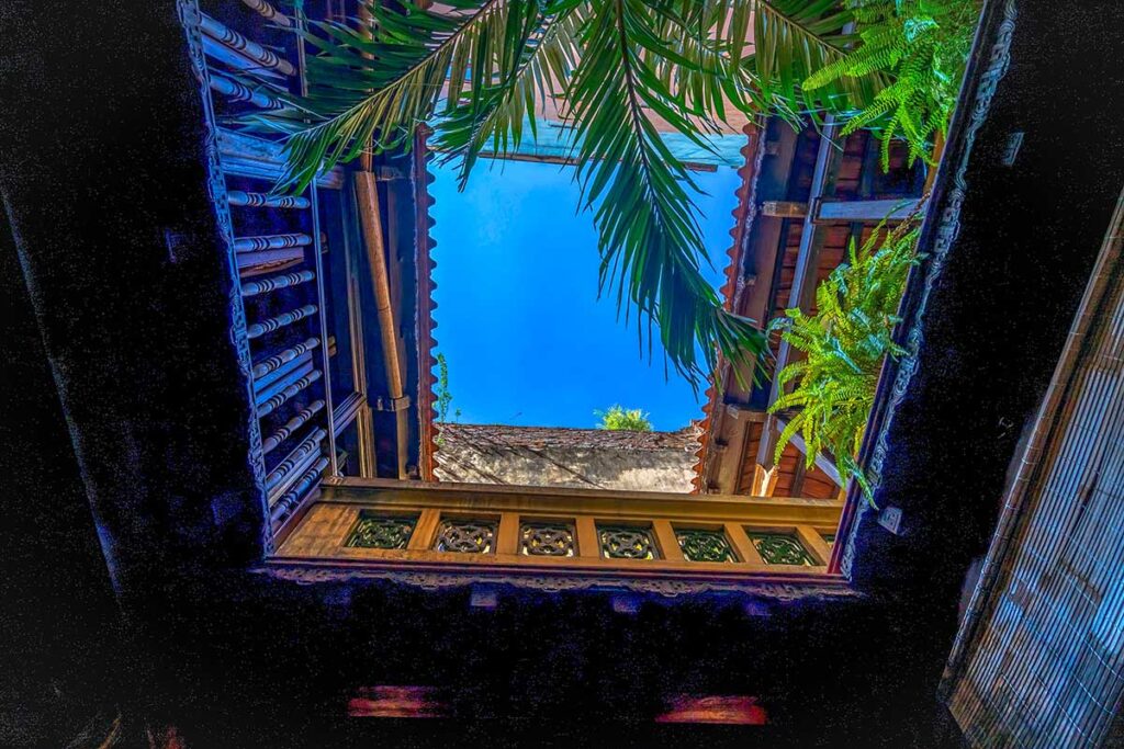 Central courtyard of Ma May Old House in Hanoi Old Quarter