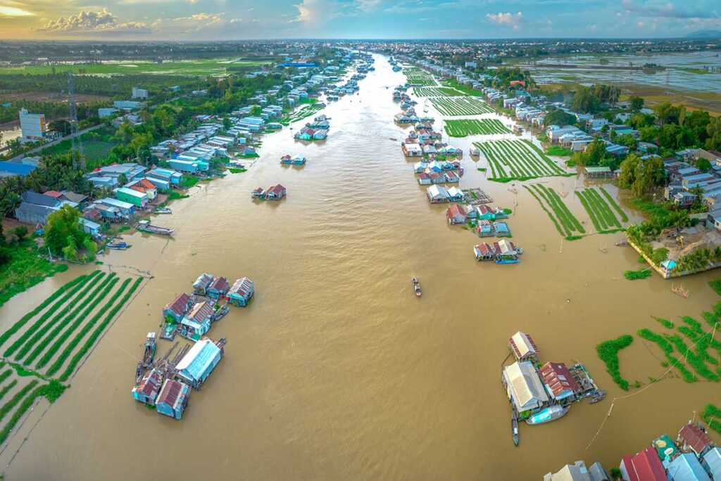 A natural flood area in the Mekong Delta with floating houses seen from the air