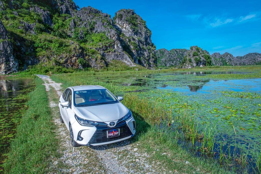A Ninh Binh car rental located in a scenic countryside setting