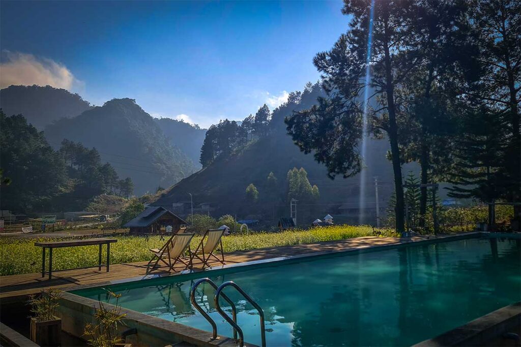 A swimming pool set up between the pine forest, part of Nordic Village at Hua Tat Pine Forest