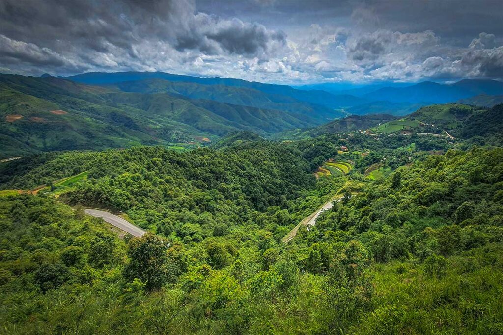 Views from the main road of Pha Din Pass over the mountains, jungles and a lower located road below