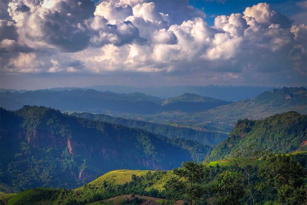 Very far views on a clear day from Pha Luong Mountain over lower mountains below