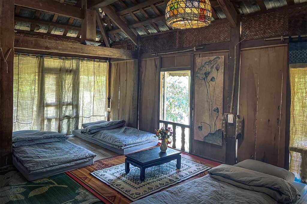 A modest traditional bedroom in a homestay in Phu Mau