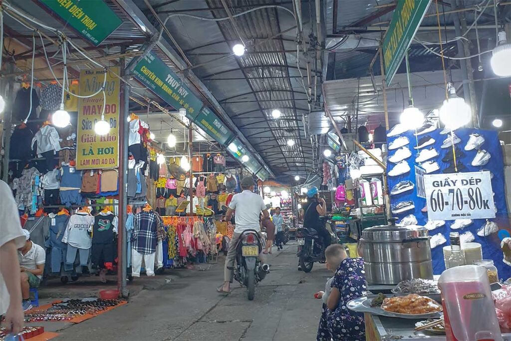 A very local market called Phung Khoang Market with lots of stalls selling different things, mostly clothes in Hanoi