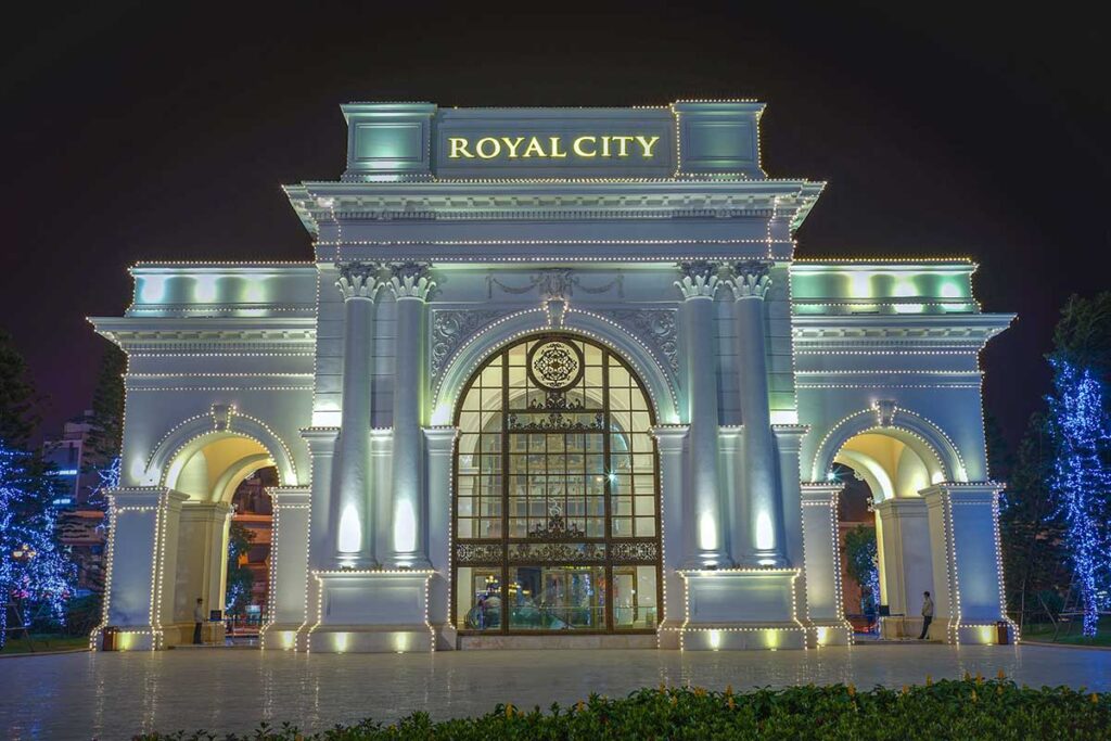 Vincom Mega Mall Royal City seen from outside at night in a mall that looks colonial style