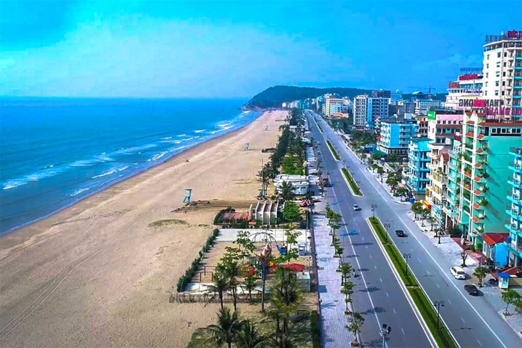 View over Sam Son Beach and the main road and town behind the beach from the side