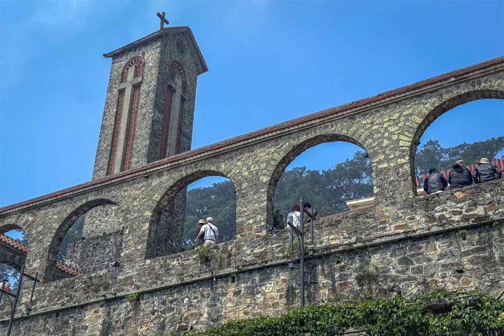 Ruins of a French colonial stone church on a hilltop in Tam Dao
