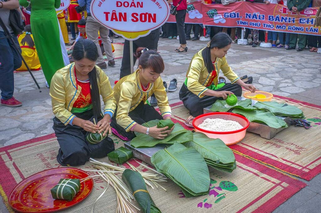 Local woman are making traditional cakes for Hung Kings Festival in Phu Tho