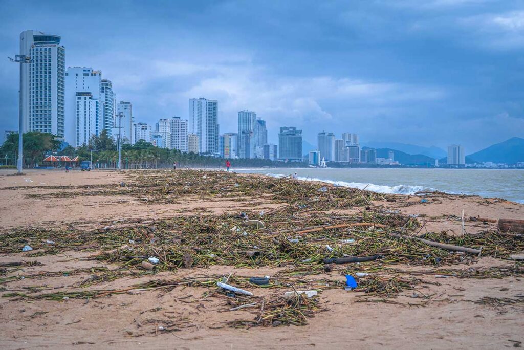 Beaches full of trash after a typhoon in Vietnam