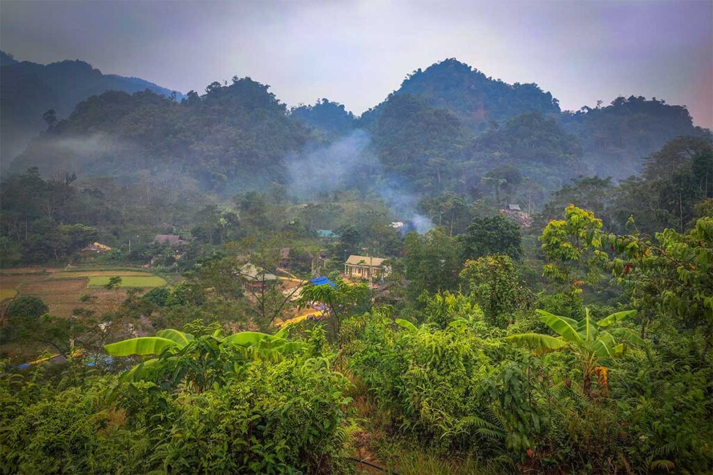 Mountains, jungles and a stilt houses in the distance in Chien Yen Commune of Van Ho District in Son La