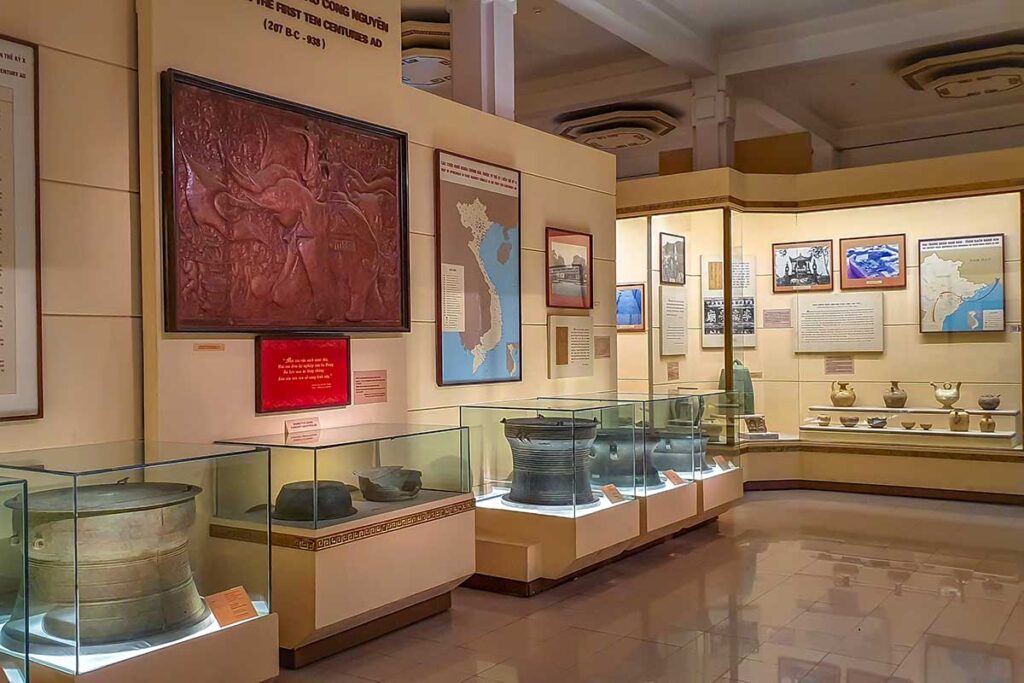 Displays of pots, statues and maps of Vietnam's ancient cultures at Vietnam National Museum of History in Hanoi