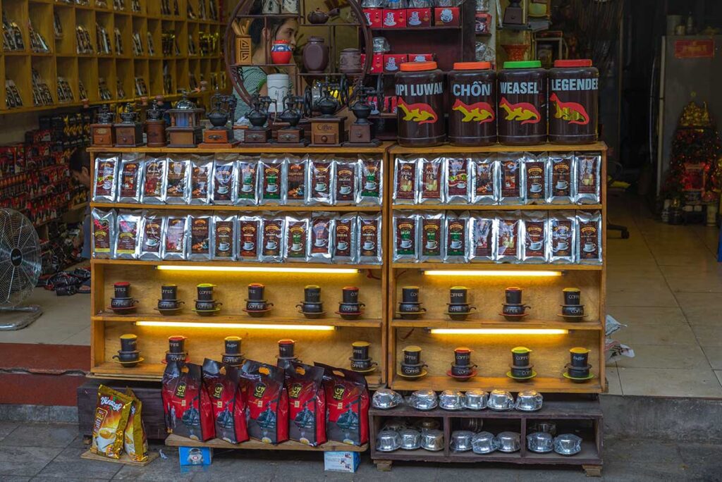 A local cafe in Hanoi selling coffee beans, powder and traditional Vietnamese phin filters