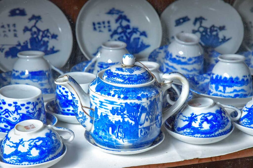 Blue and white porcelain tea set on display at Ba Duc Ancient House, Tien Giang Province