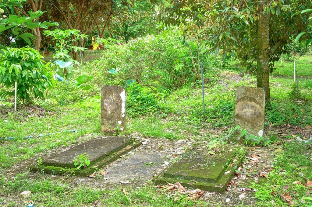 Old family graves in the garden of Ba Duc Ancient House, Dong Hoa Hiep village, Cai Be