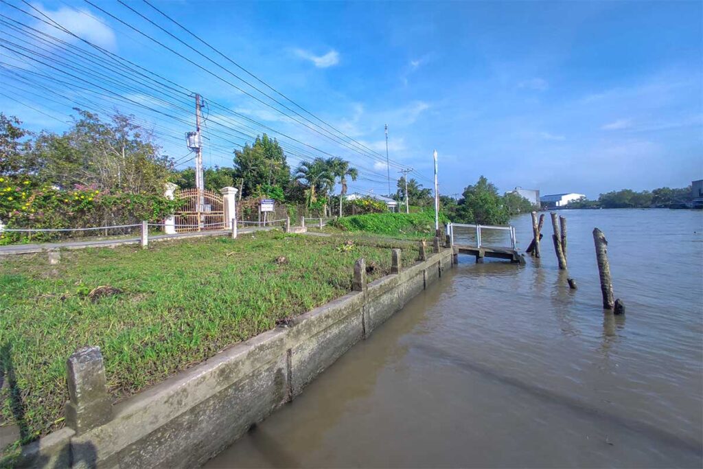 Riverside boat dock for arriving at Ba Duc Ancient House by sampan or boat