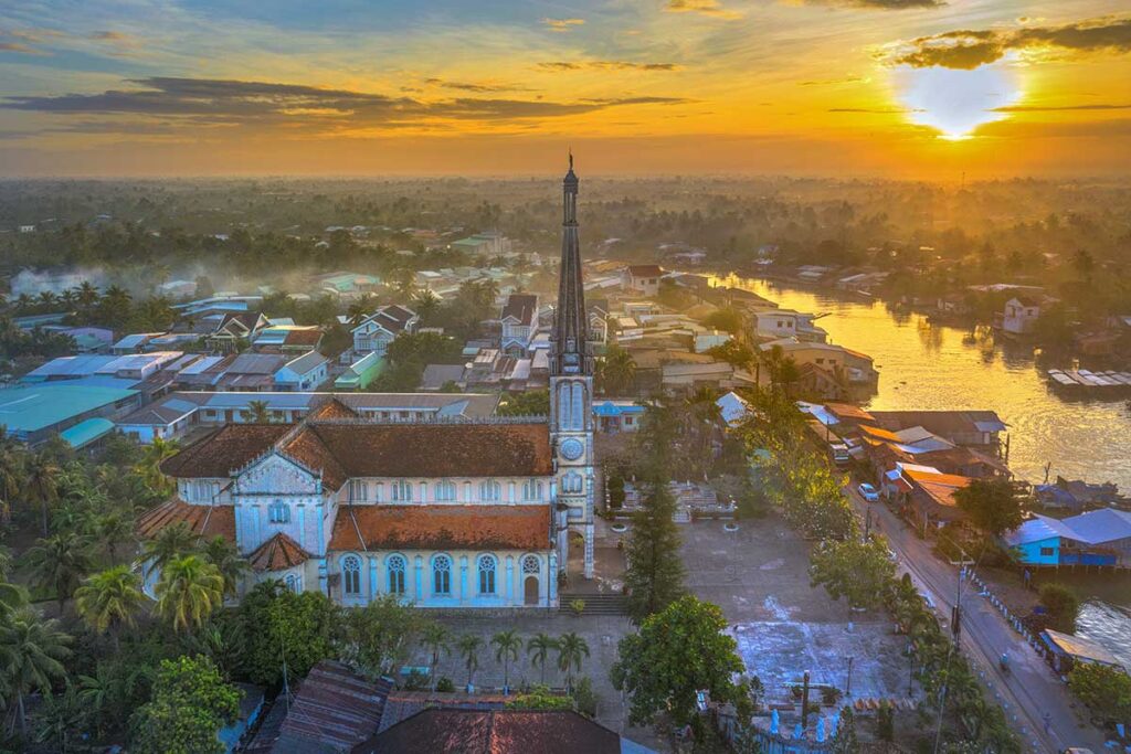 Aerial view of Cai Be Church at sunset