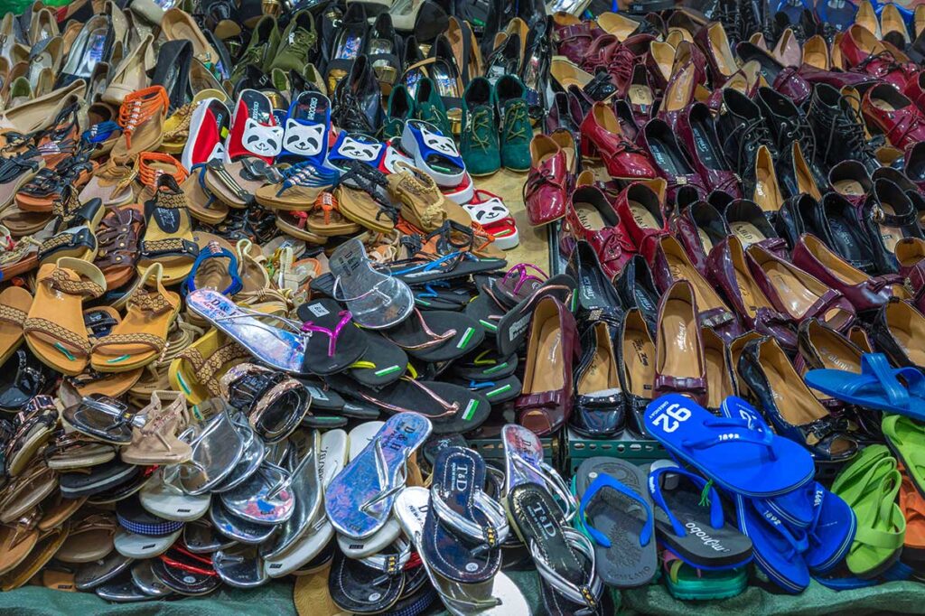 A pile of flip-flops and cheap shoes being sold at the Ninh Kieu Night Market