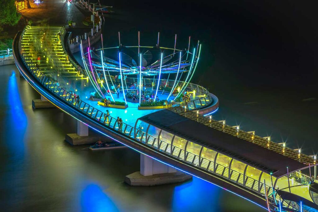 Aerial view of the Can Tho Walking Bridge (Love Bridge) in the evening with LED lights on