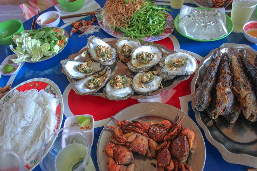 A whole seafood meal with crab, shellfish and fish served at Cape Ca Mau