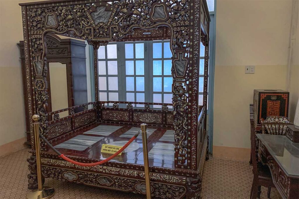 A antique bed inside one of the bedrooms within Prince of Bac Lieu’s House