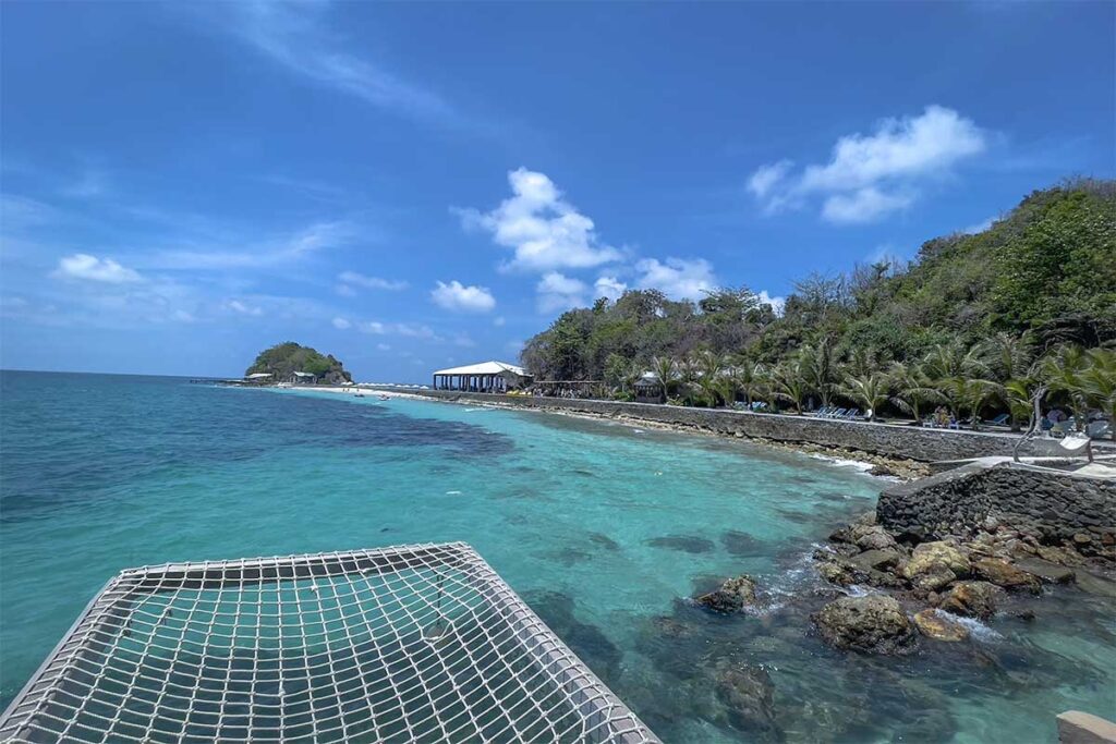 Hon Hai Bo Dap islet from the sea – Small rocky island surrounded by clear blue water, part of Nam Du boat trip itineraries.