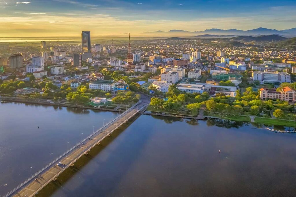Hue city center with Perfume River on the foreground seen from the air