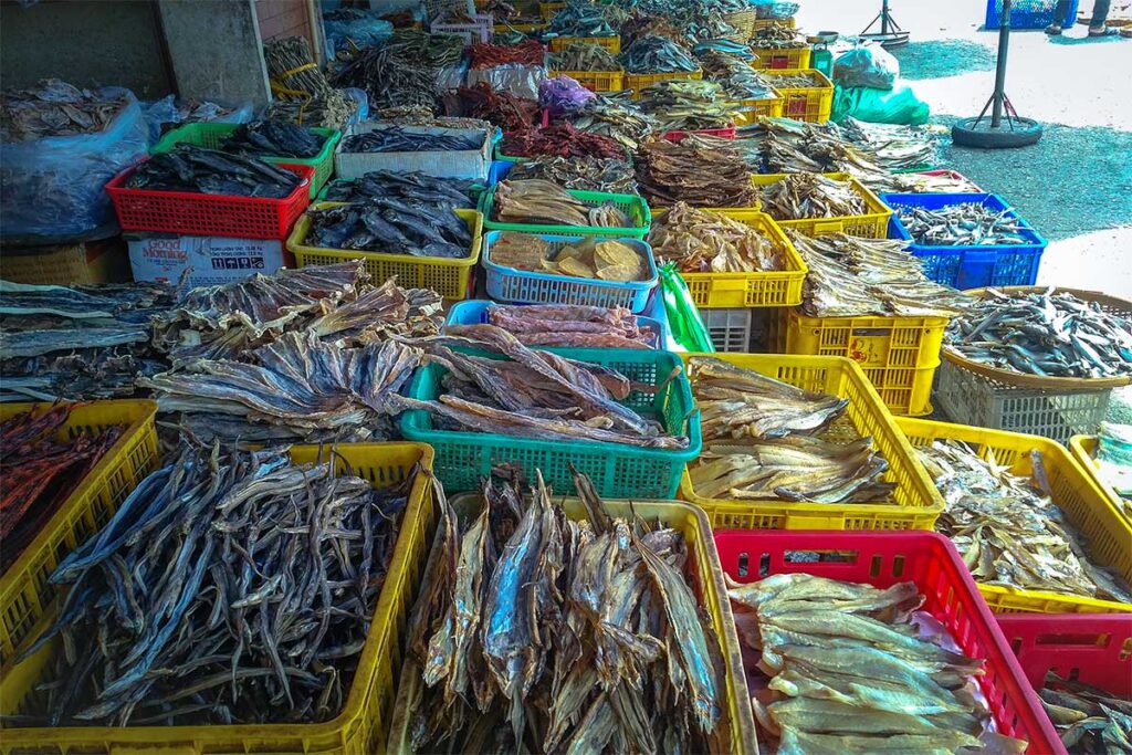Stacks of dried fish and seafood on display at My Tho Central Market