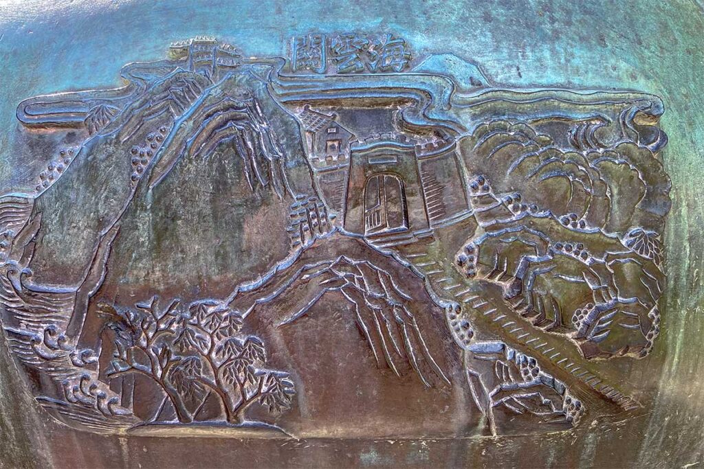 A closeup of one of the carvings on one of the nine dynastic urns standing in Hue Imperial City