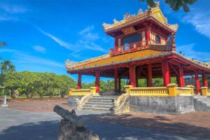 The Phu Van Lau Pavilion with a small canon in front of it
