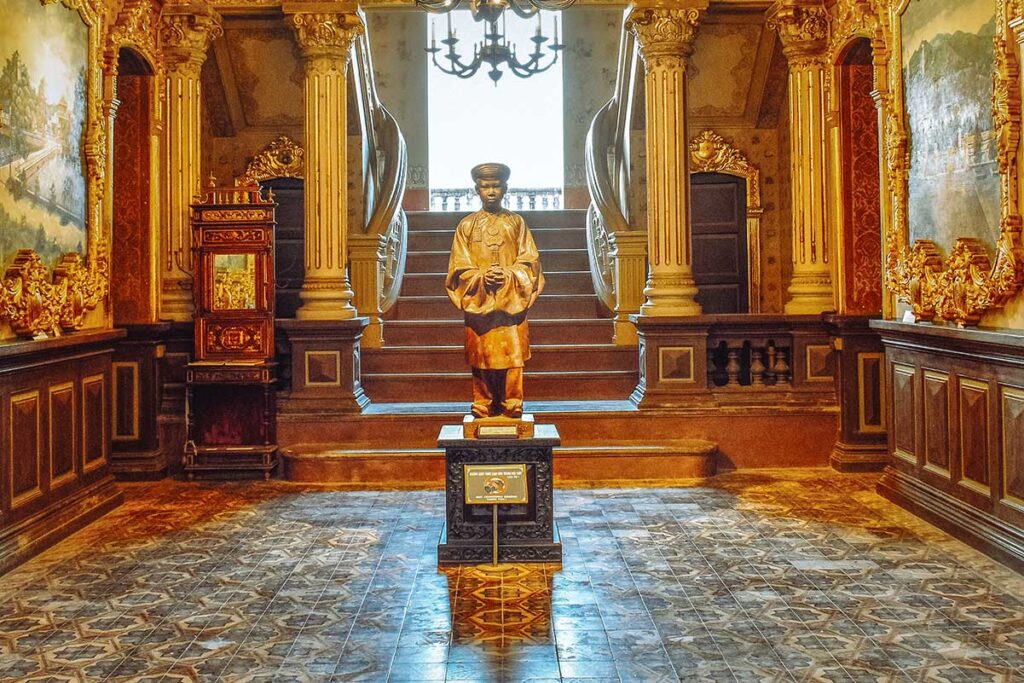 Statue of Khai Dinh in the main hall of An Dinh Palace