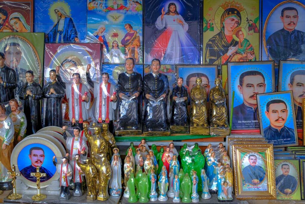 Souvenirs being sold related to Father Truong Buu Diep at Tac Say Church
