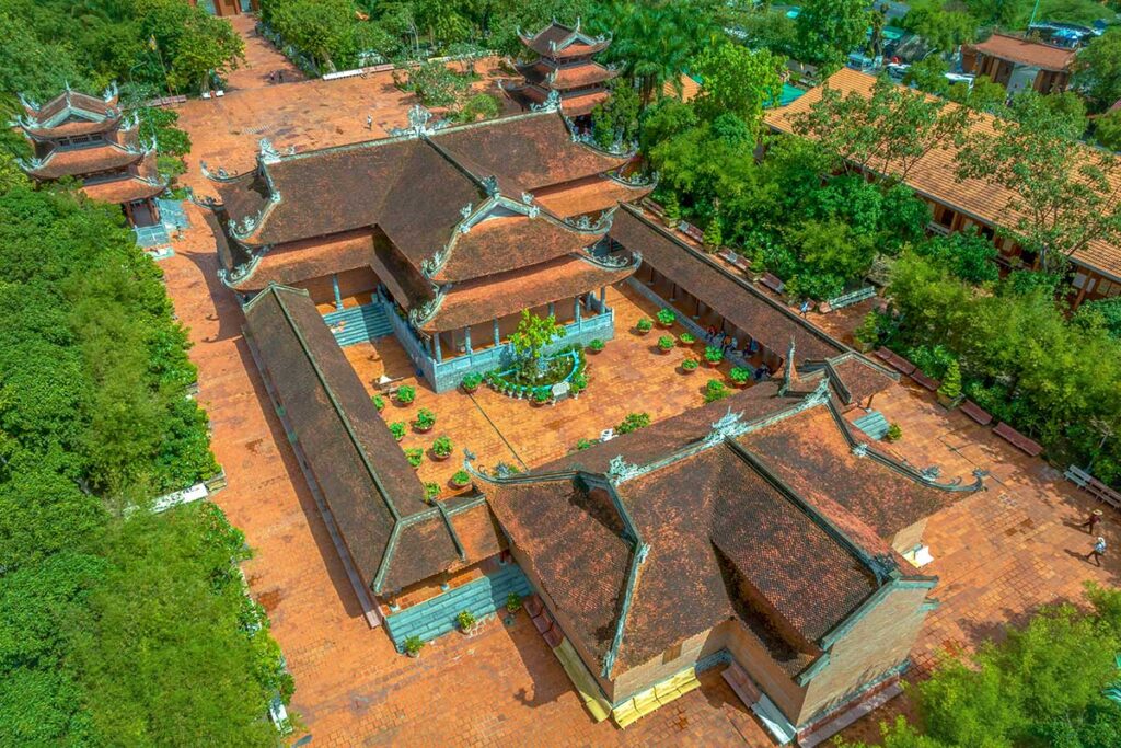 Aerial view of Truc Lam Phuong Nam Zen Monastery in Can Tho, showing its traditional Vietnamese architecture and large courtyard.