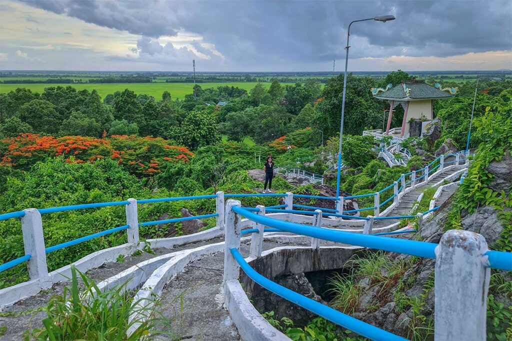Concrete paths leading over tree tops at Tuc Dup Hill in An Giang