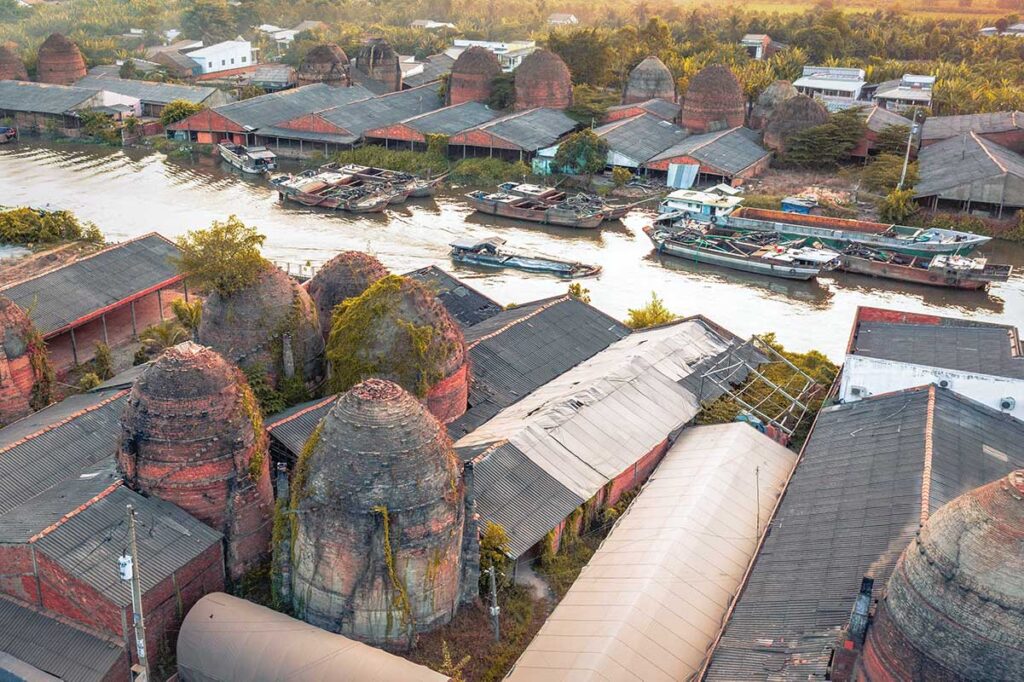 Moss-covered abandoned kilns and riverside workshops in Mang Thit, Vinh Long