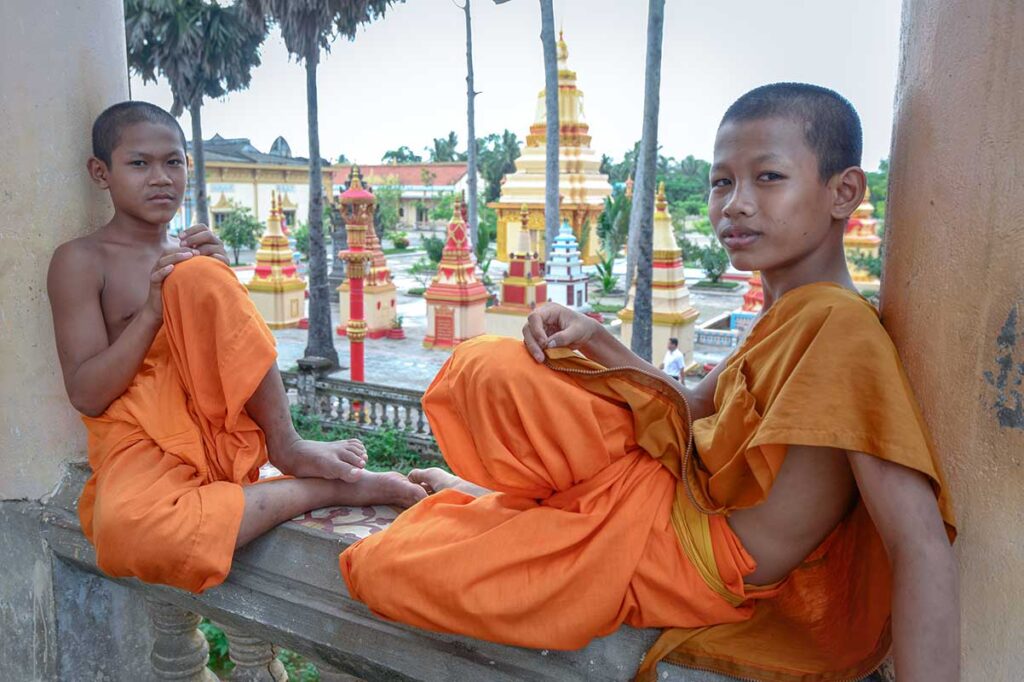 Two novices monks rest leisurely in Xiem Can pagoda