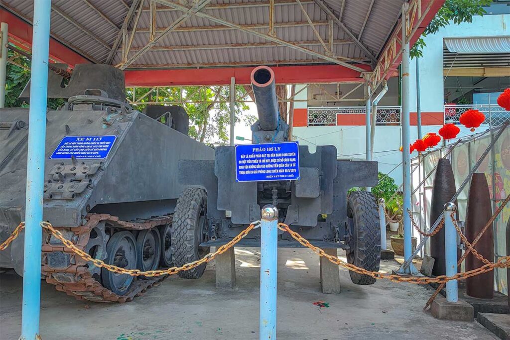 War relics at An Giang Museum, Long Xuyen – Old military tank and artillery cannon displayed in the outdoor section of An Giang Museum.