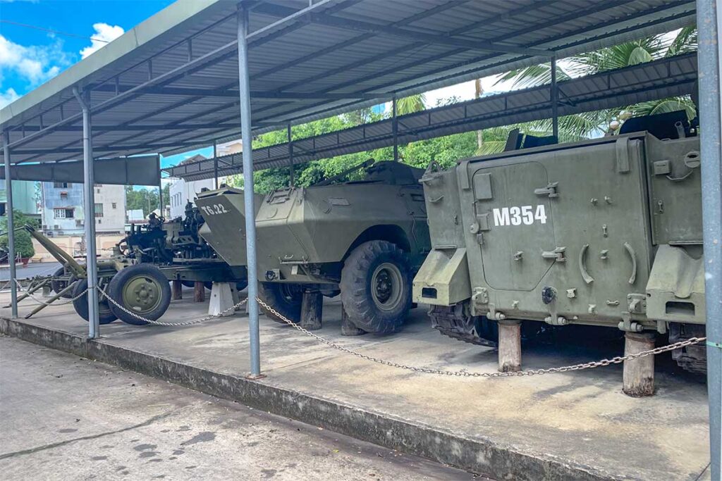 Outdoor display of armored vehicles and artillery at Can Tho Museum, part of its war history collection.