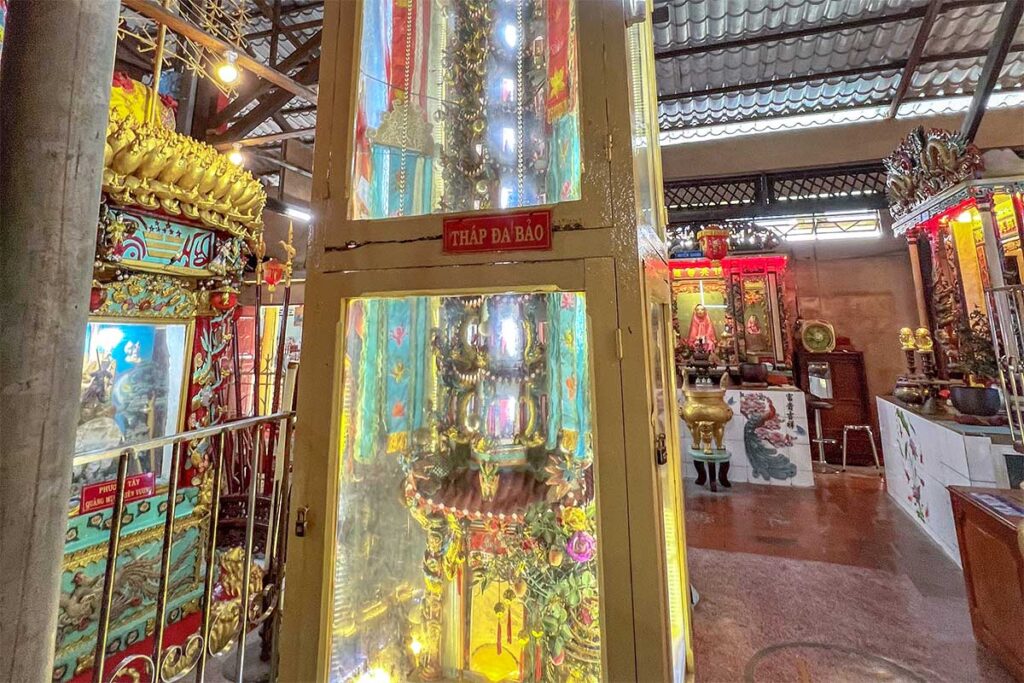 Da Bao Tower at Clay Pagoda (Chùa Đất Sét) in Soc Trang, a 13-tier clay tower built in 1939 with 208 Buddha statues and dragon decorations inside the main hall.