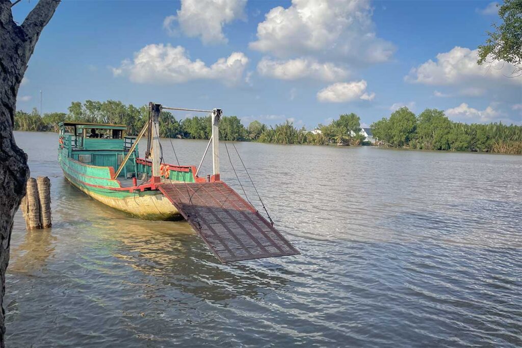 Local ferry boat crossing the Co Chien River to Con Chim Island in Tra Vinh, the only way to access the community-based tourism islet