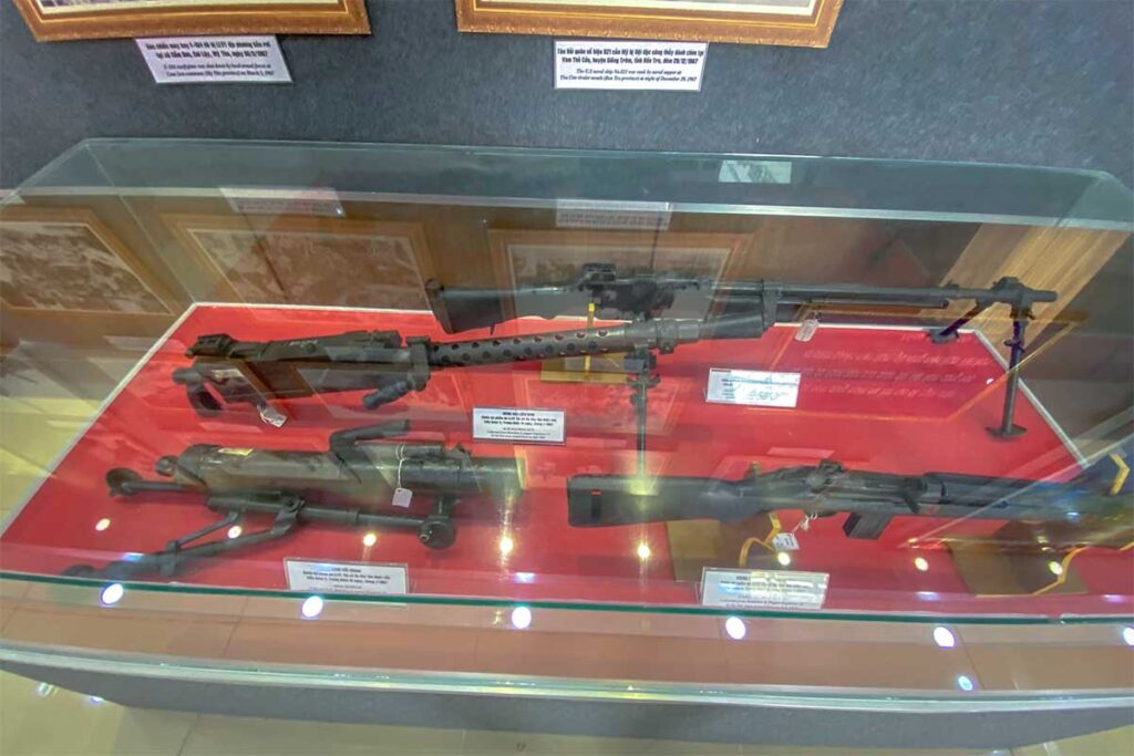 Wartime guns and machine rifles on display inside Military Zone 9 Museum in Can Tho