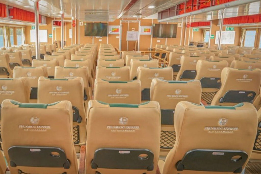 Interior of a Phu Quoc Express ferry – modern tan leather seats and onboard facilities on the Ha Tien to Phu Quoc crossing.