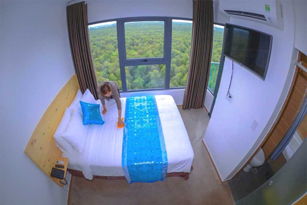 Tower hotel room with panoramic forest view at Tan Lap Floating Village, Long An