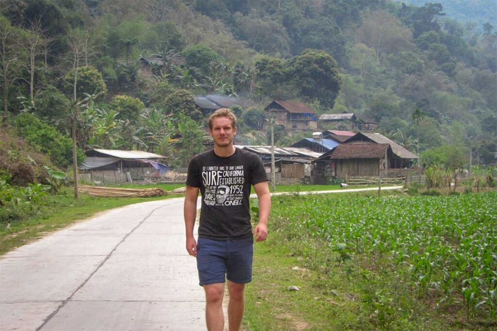 Marnick Schoonderwoerd from Local Vietnam walking through a Tay ethnic village near Ba Be Lake, Vietnam