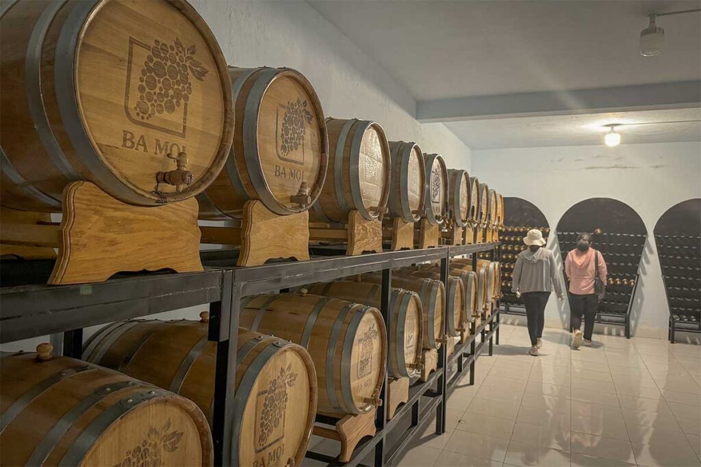 Wooden wine barrels stored at Ba Moi Vineyard’s cellar in Ninh Thuan.