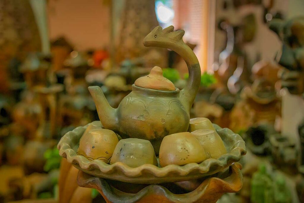 Unique dragon-shaped teapot and cups set, handcrafted by Cham artisans in Bau Truc Pottery Village, Ninh Thuan.