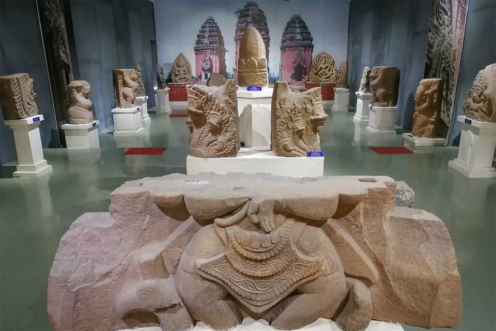 Cham sculpture gallery at Binh Dinh Museum, showcasing carvings from ancient towers.