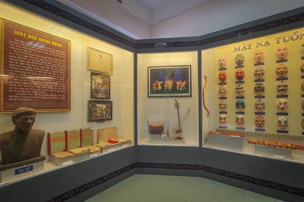 Hat Boi theatre masks and musical heritage display at Binh Dinh Museum, Quy Nhon.