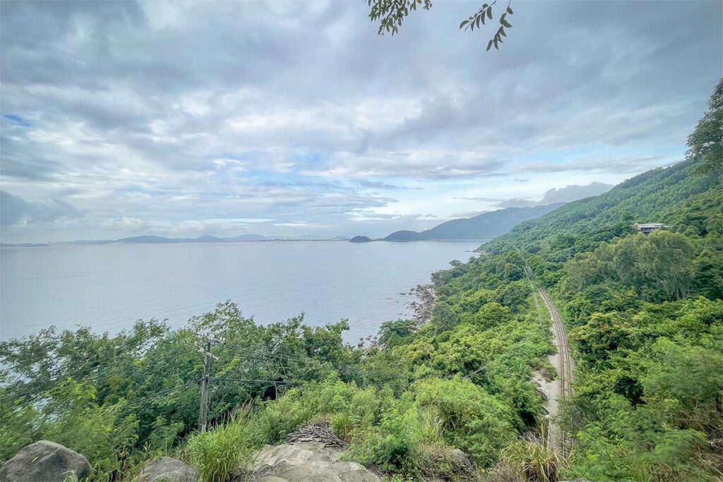 Train track view from Ca Pass – Railway line cutting through green hills along the coastline near Deo Ca Pass, one of the most photogenic rail sections in Phu Yen.